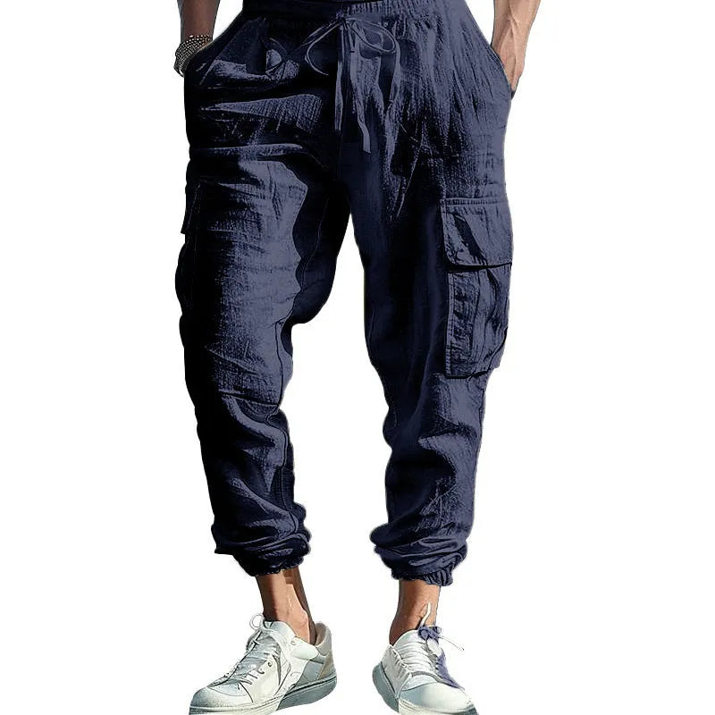 Men's linen casual trousers with ankle ties and multiple pockets in solid colour
