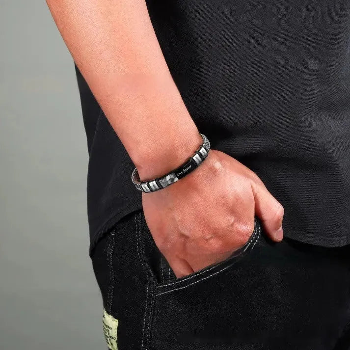 Titanium steel bracelet with leather rope design featuring lettering beads and heart charms