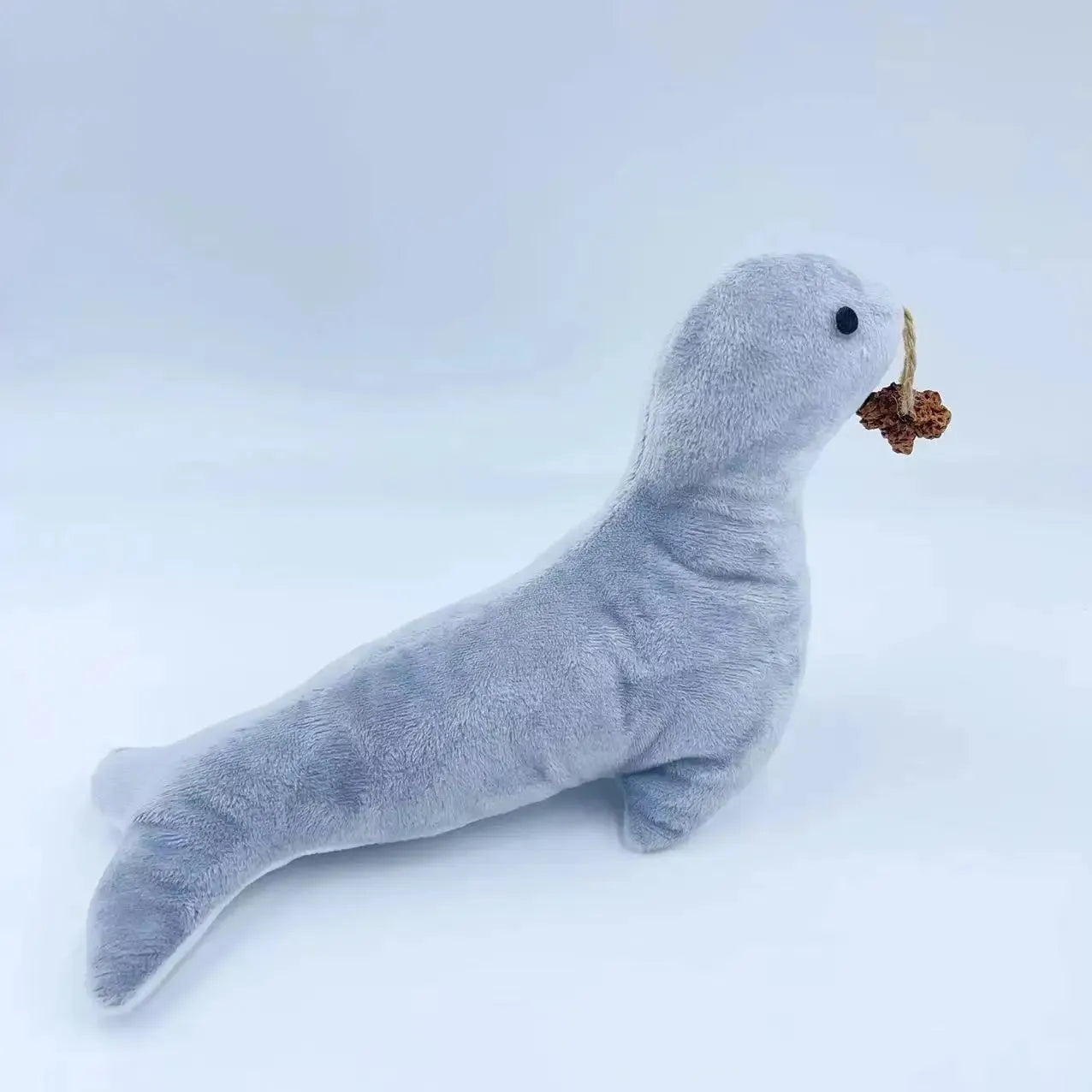 Blue sea lion plush cat toy with bell and catnip for teeth grinding and interactive play