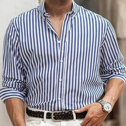 Man wearing a loose-fit striped button shirt in a casual cardigan style