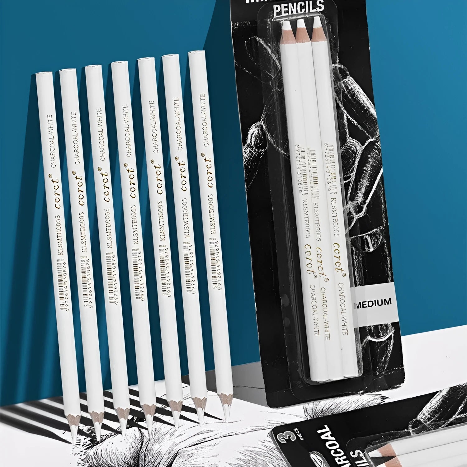 Set of three white powder lead sketching pencils with wooden barrels for dark paper drawing.