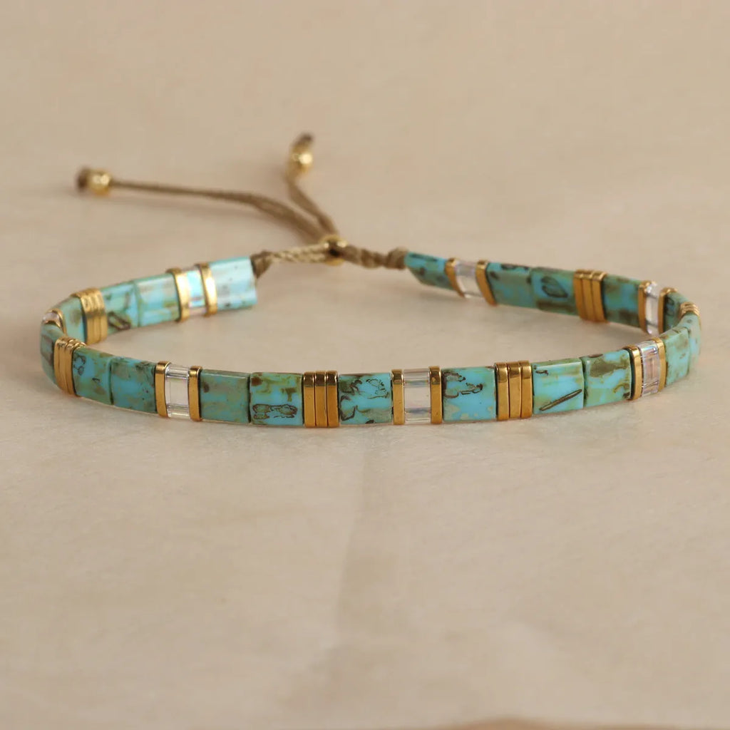 Geometric glass beaded bracelet with pull beads in five colour options