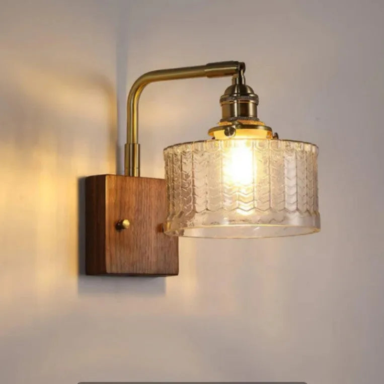 American retro wall lamp with walnut glass brass construction, green glass shade, installed on living room wall