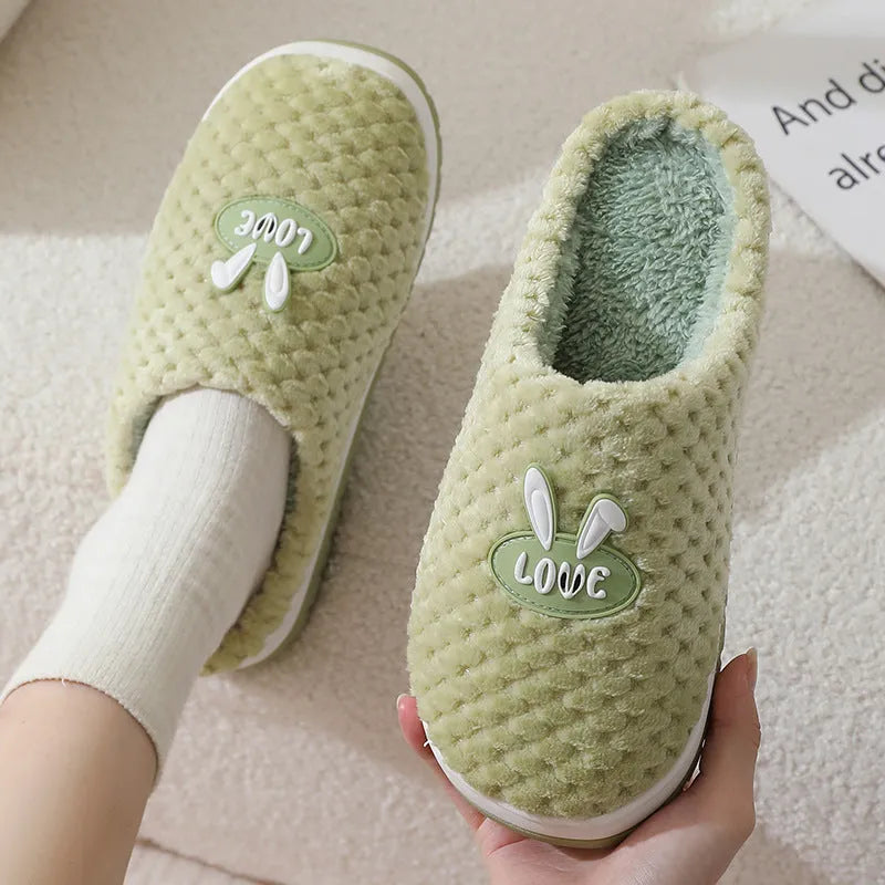 Women's plush rabbit plaid design house slippers with artificial fur and a light brown anti-slip rubber sole.