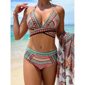 Women's blue cross bandage swimsuit three-piece set with high waist briefs showing veil split detail
