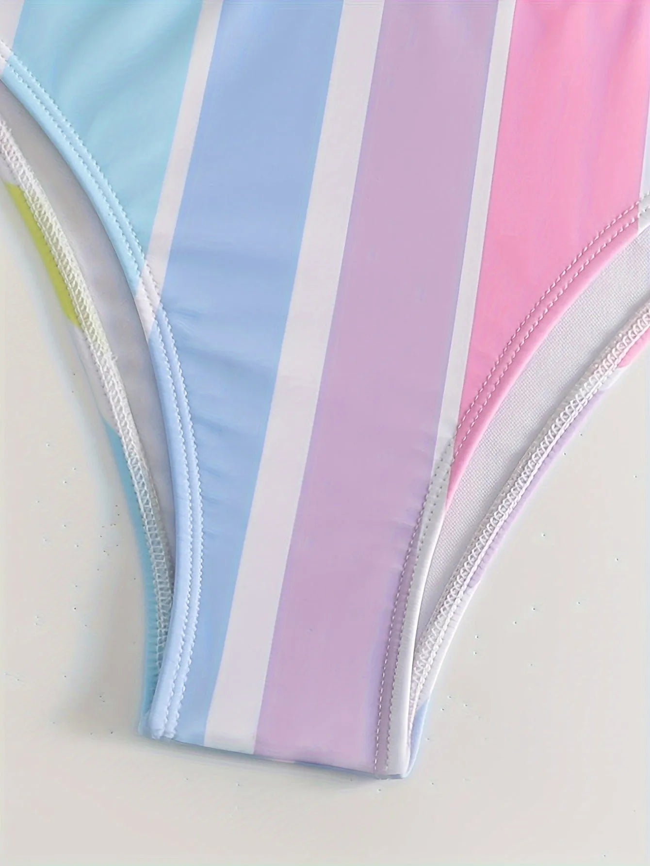 Women's striped bikini set in picture colour, briefs style with spandex lining.