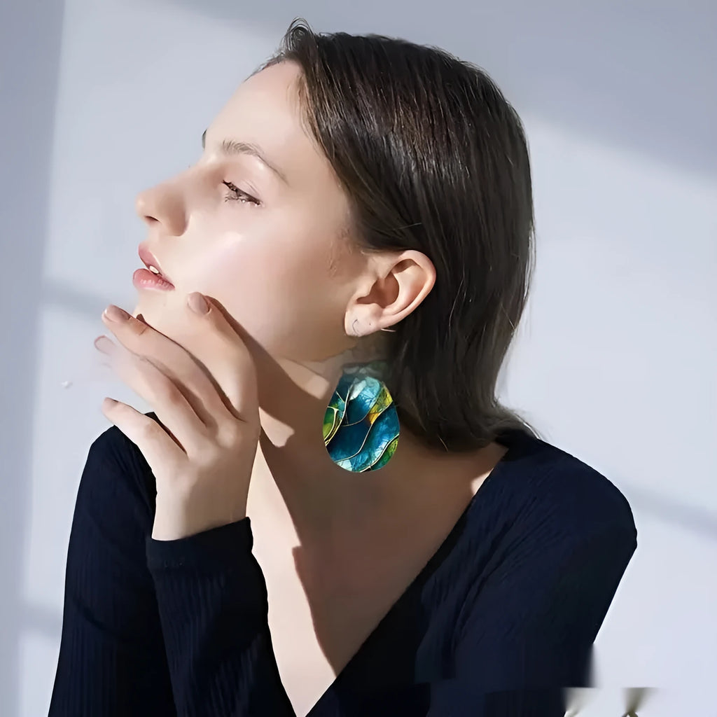 Acrylic flat branch knot drop earrings with printed design in unisex style.