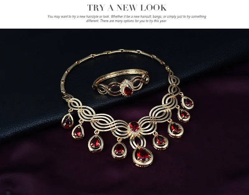 Women's alloy jewellery set with rhinestone pendant, earrings, and bracelet in 18K gold colour