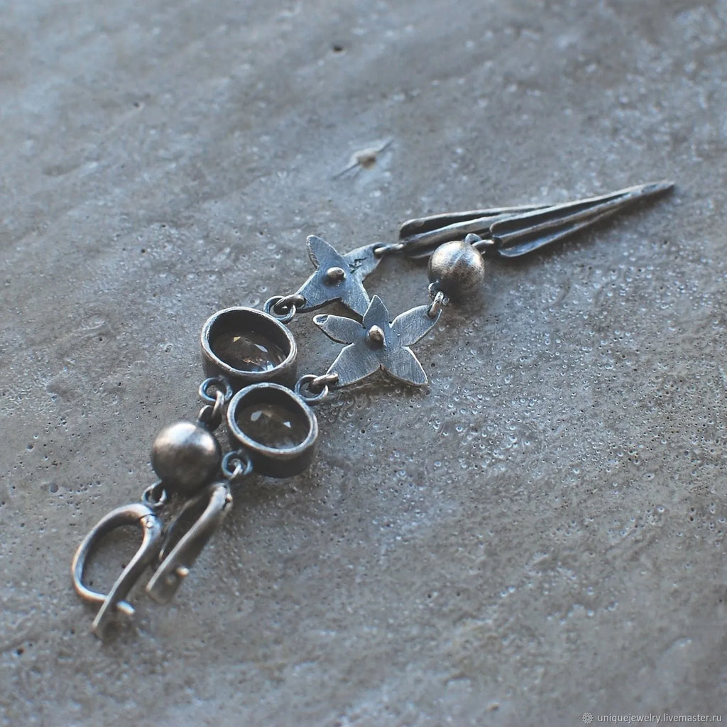 Geometric XINGX pendant earrings in antique silver finish with long drop design