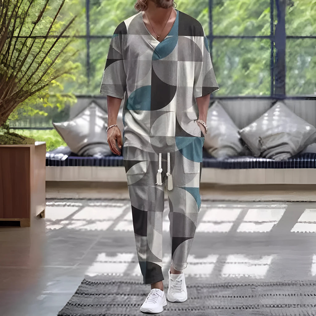 Women's cropped sleeve V-neck trousers suit in thin polyester fabric showing jacket and matching trousers