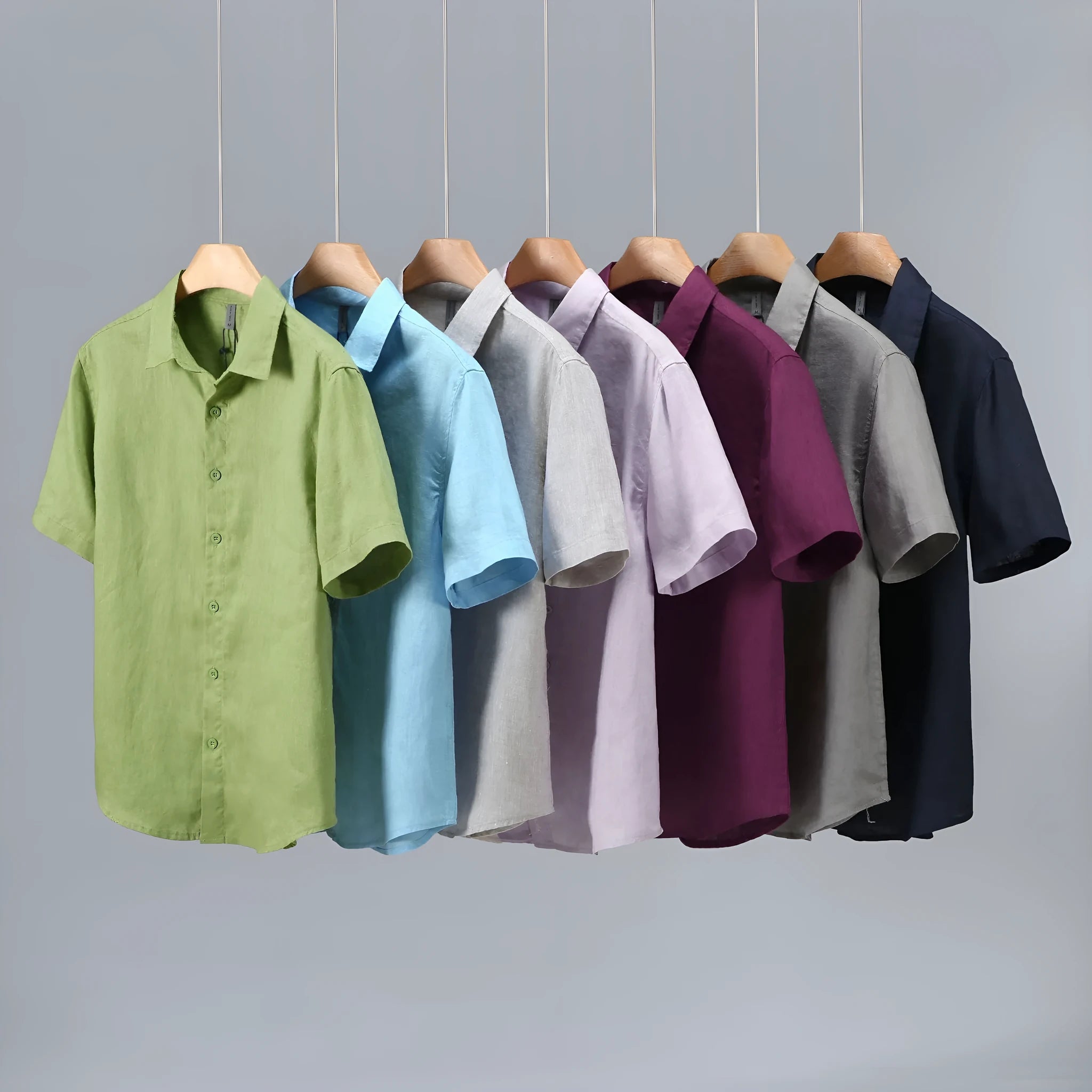 Men's casual short-sleeved linen shirt in regular fit showing colour options including apricot, dark blue, and gray
