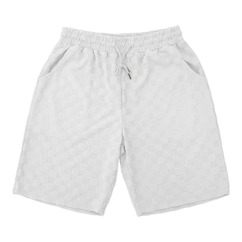 Checkerboard plaid sports shorts in loose fit with straight leg design