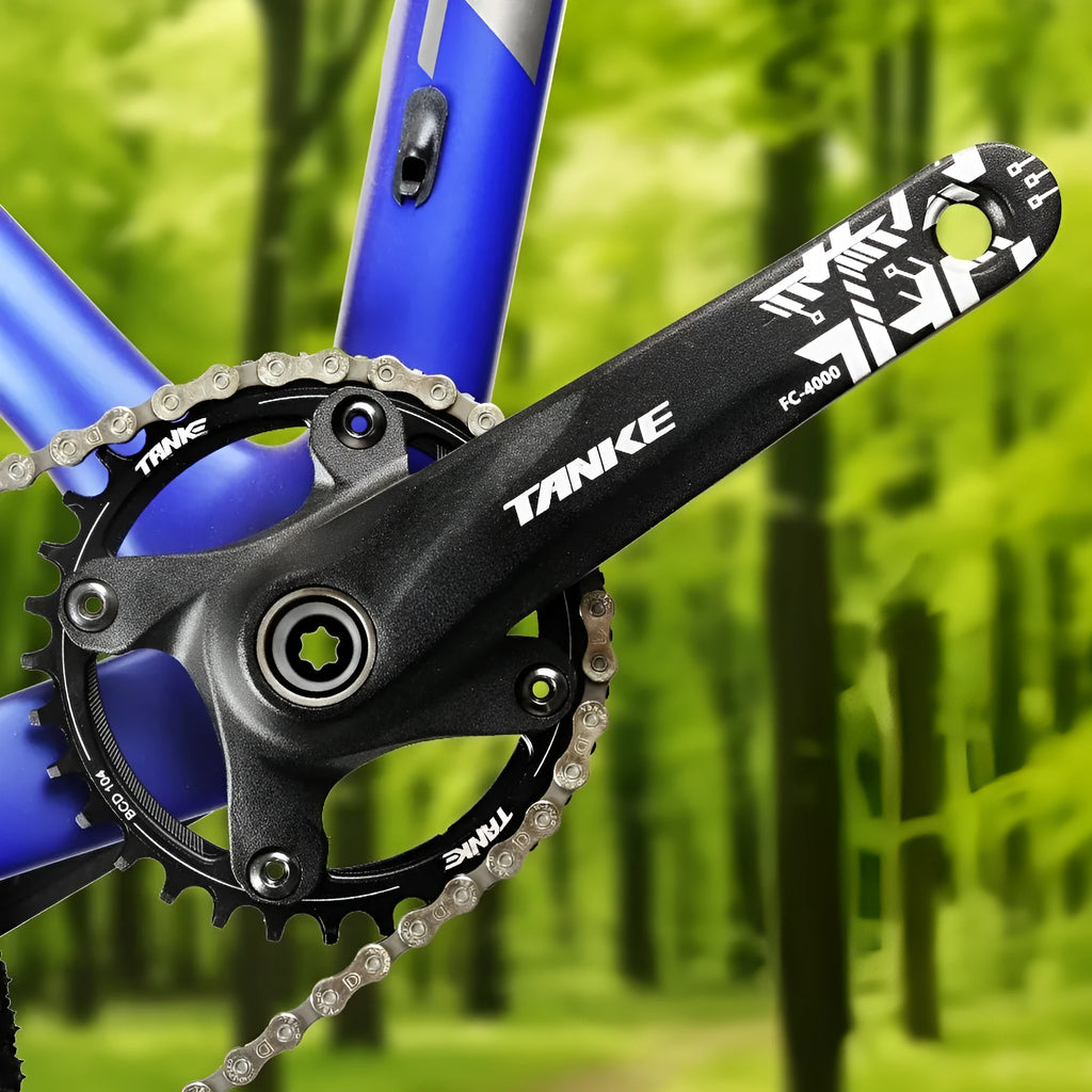 Mountain bike GXP crank set with aluminium alloy tooth plate and steel central shaft in black, red or purple