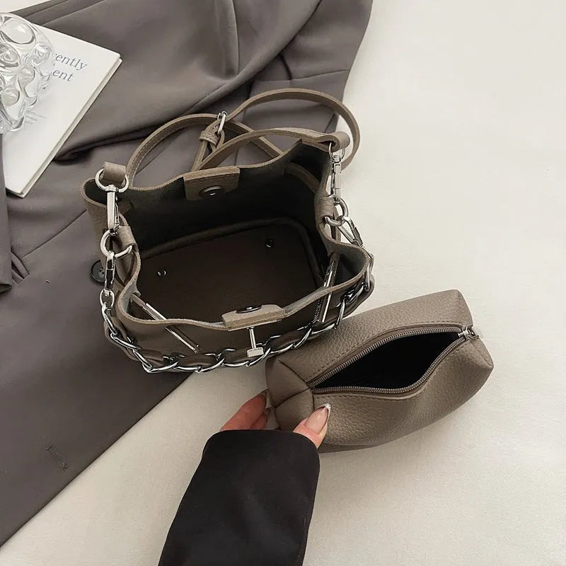 Retro black PU leather bucket shoulder bag with chain detail and adjustable strap