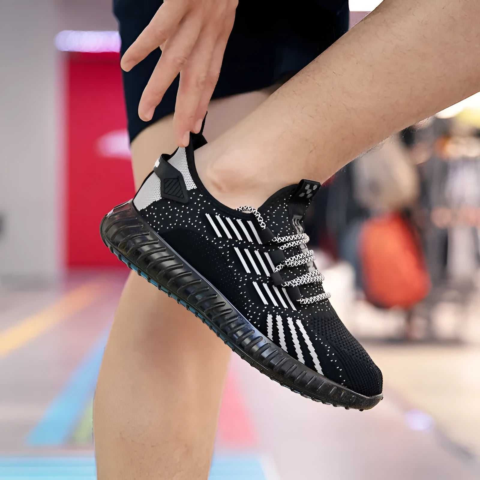 Men's white breathable sports shoes with mesh lining and a platform sole on a neutral background.