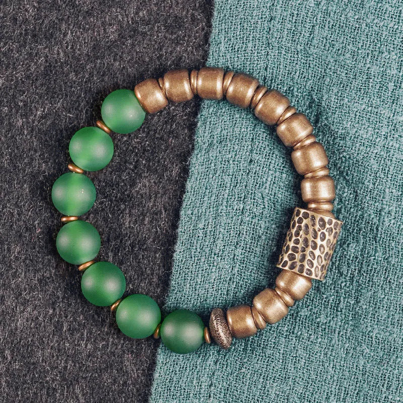 Ethnic couples bracelet with antique-finished green agate beads on natural cord.