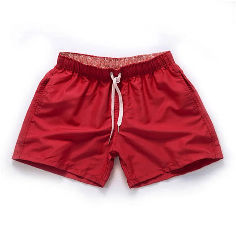 Men's straight leg beach shorts in multiple colours including fluorescent yellow for surfing