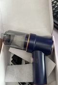 Mini rechargeable cordless handheld vacuum cleaner in Moran Blue with brush and long straw attachments
