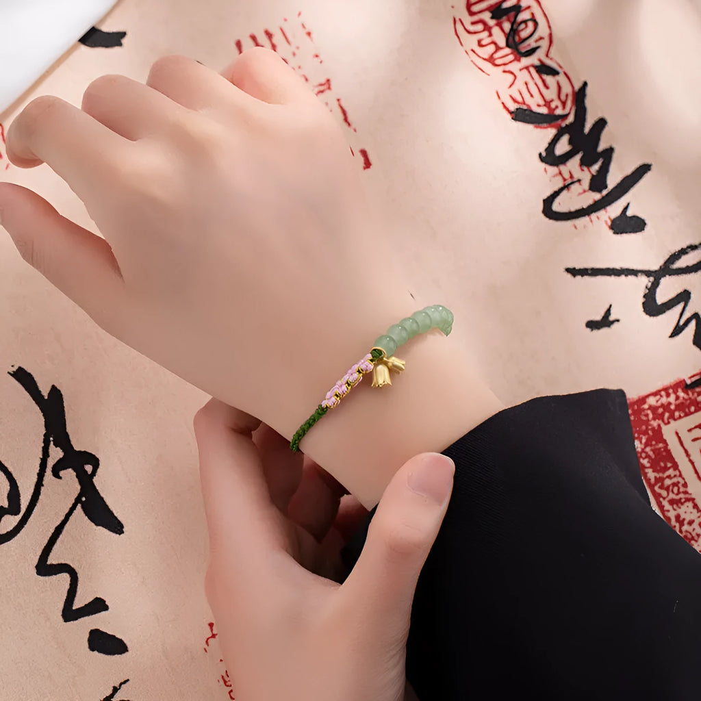 Red rope hand-woven bracelet with lily design and floral elements for women