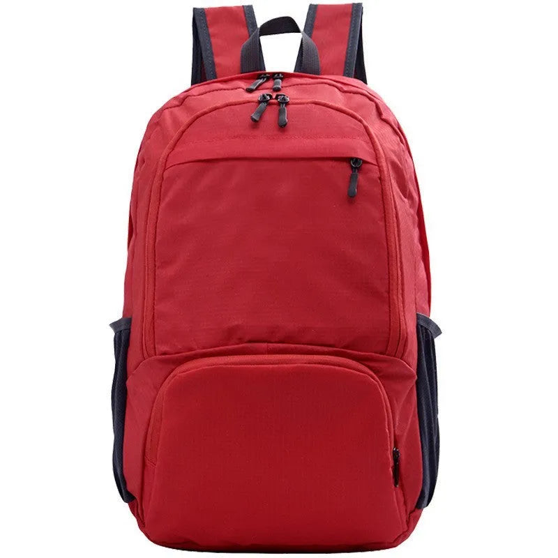A 26-inch waterproof Oxford cloth backpack in a solid colour, shown folded and unfolded.