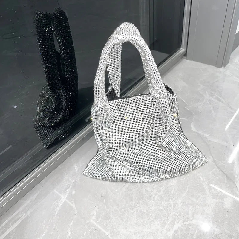 Silver handbag with shiny rhinestone decoration and open pocket design