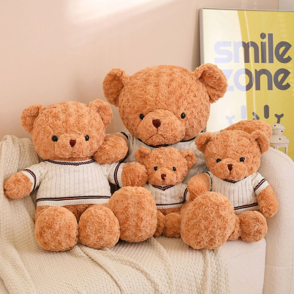 White sweater teddy bear plush doll with PP cotton filling and cloth velvet cover, shown in front view