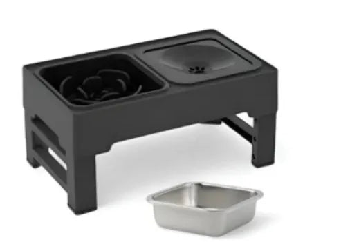 Adjustable height black and grey plastic dog feeder stand with two stainless steel bowls at medium setting