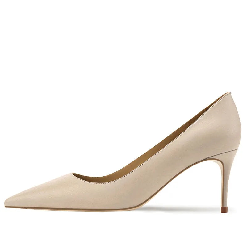 Women's high-heeled pointed toe shoes with soft sole construction in black and skin tones