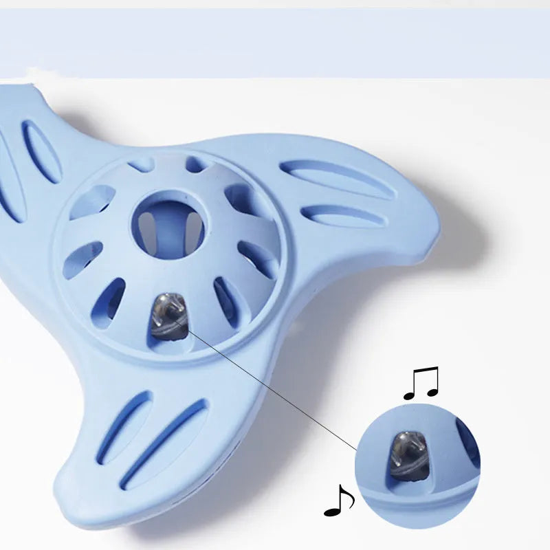 Blue bite resistant boomerang-shaped dog toy for medium and large breeds on a plain background.