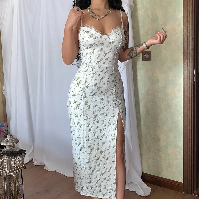 Women's blue lace flowers print maxi dress with suspender straps and a side slit.