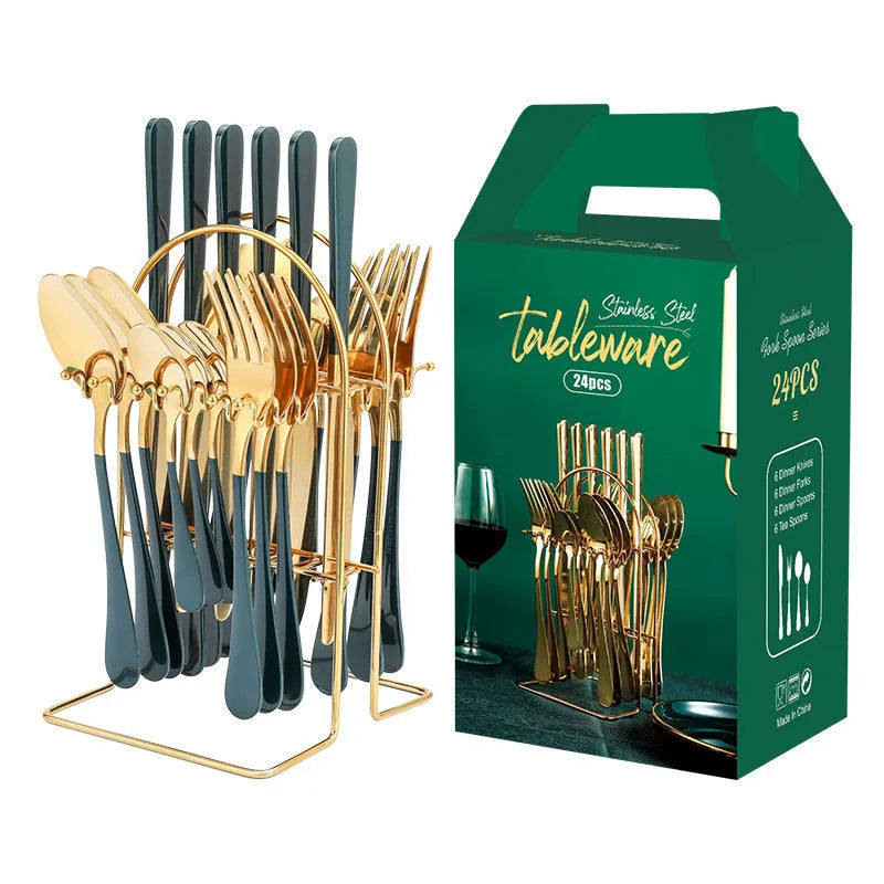 24-piece gold stainless steel cutlery set with knives, forks, spoons and a storage rack.
