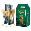 24-piece gold stainless steel cutlery set with knives, forks, spoons and a storage rack.