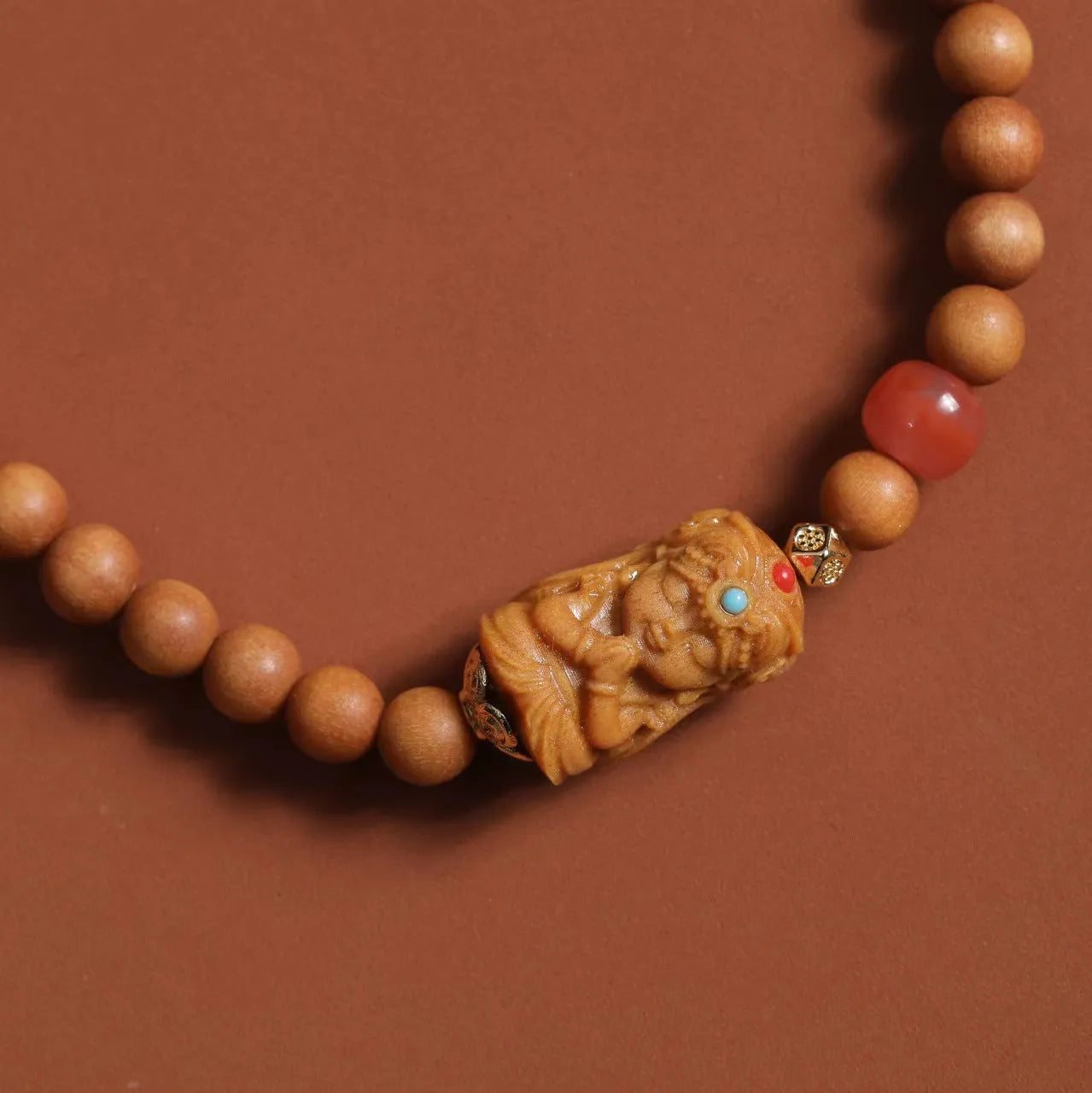 Brown sandalwood bracelet with 6mm round beads in double circle woven design