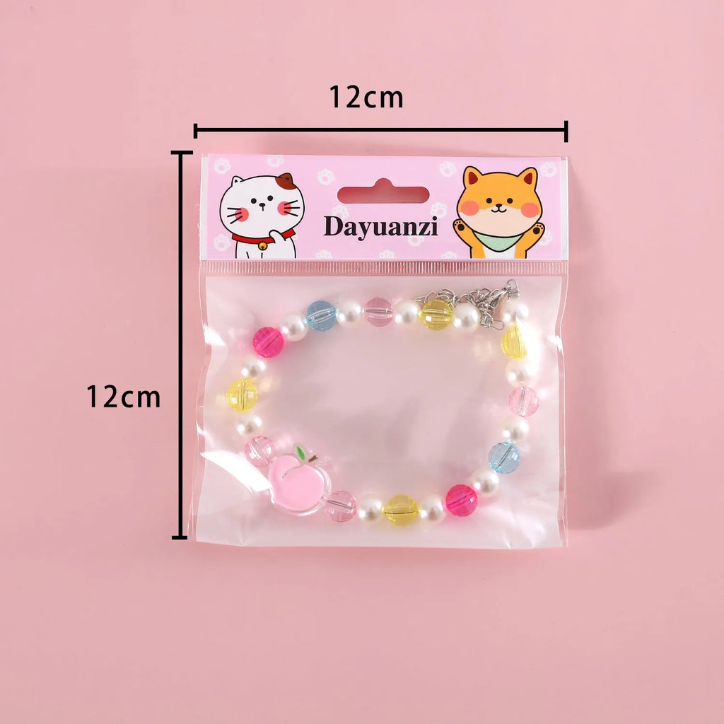 Colourful plastic bead pet necklace for cats in peach pattern with adjustable sizing