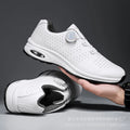 Men's black and white low-top casual tennis shoes with mesh upper and cross shoulder straps