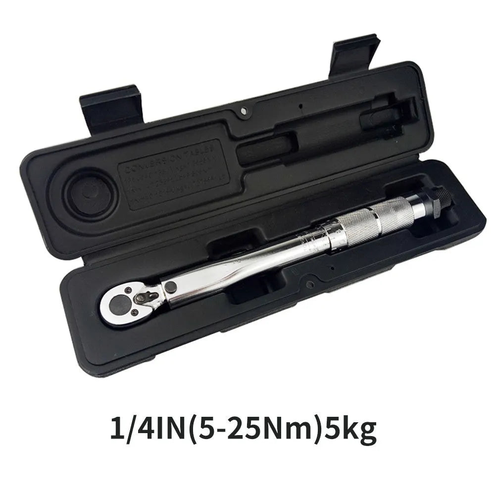 Five-piece multifunctional torque preset torque wrench set with extension rods on a workbench