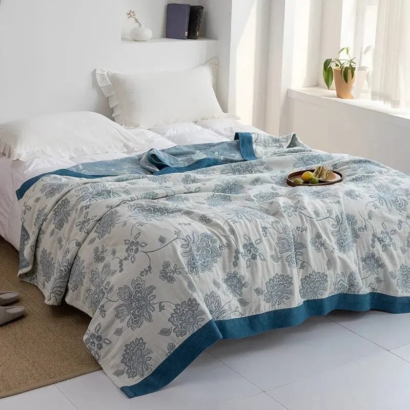 Pure cotton five-layer gauze summer towel blanket in a modern simple style, shown folded.