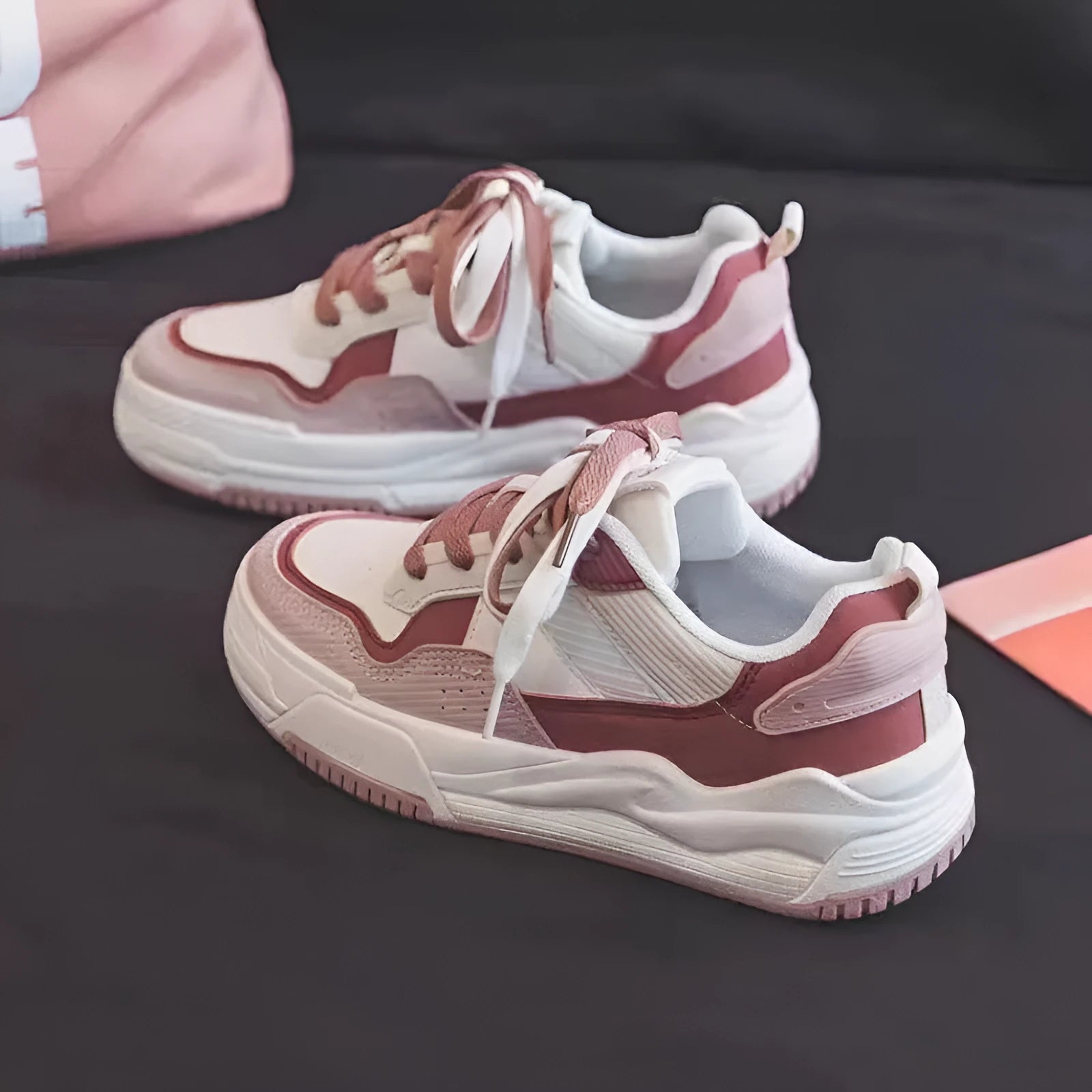Women's pink spring sneakers with low top design and rubber sole