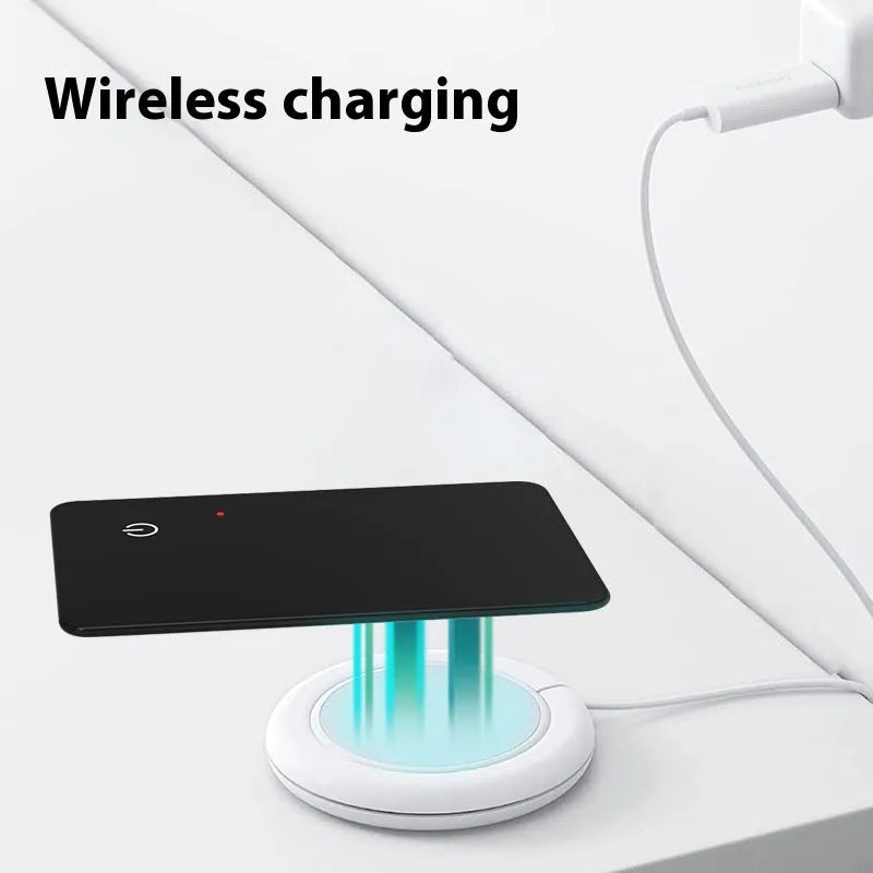 Black plastic pet tracking device with card shape, hanging hole, and wireless charging via NFC interface