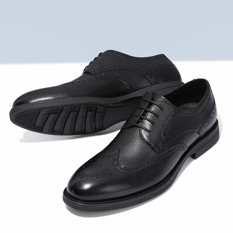 Men's black brogue leather shoes with traditional wingtip design and perforated patterns