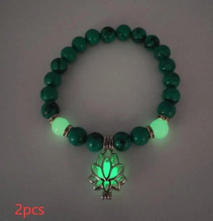 Luminous lotus charm bracelet with mesmerizing glow-in-the-dark beads, made of premium alloy and turquoise fluorescent stone