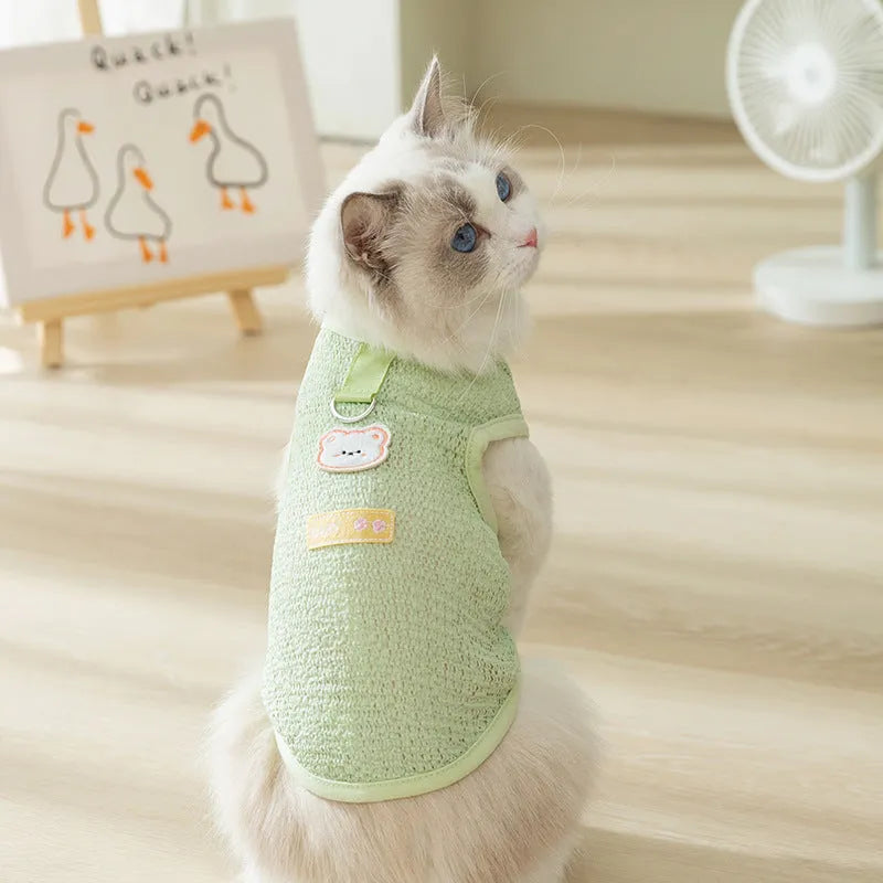 Bear patch cat clothes in hollowed-out knitted fabric showing breathable pattern