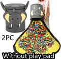 Green foldable felt cube storage bag with pull rope, shown both as a container and laid flat as a play mat.