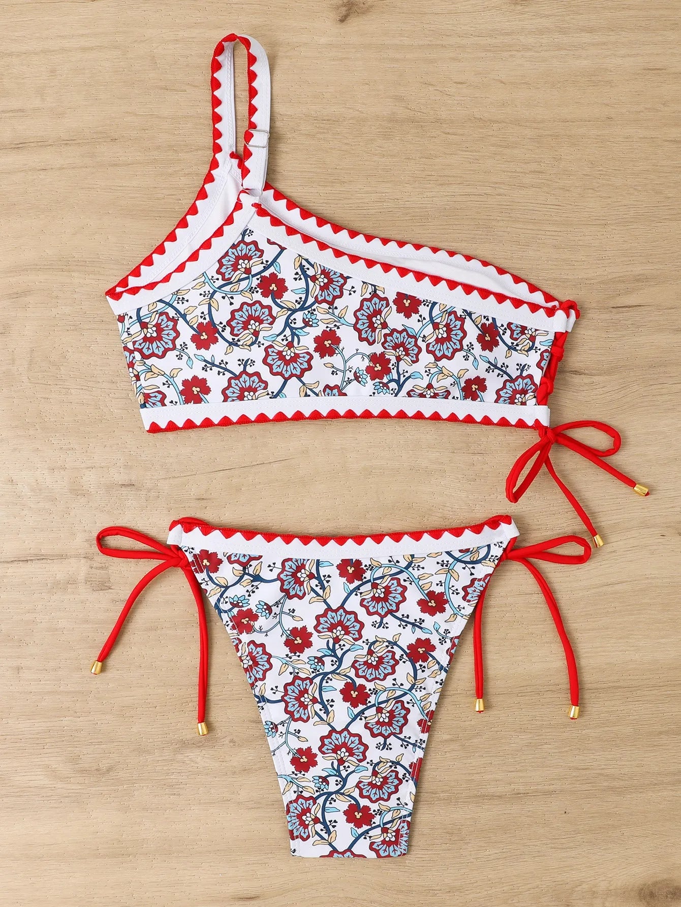 Women's blue and red one-shoulder floral bikini set with briefs-style bottom