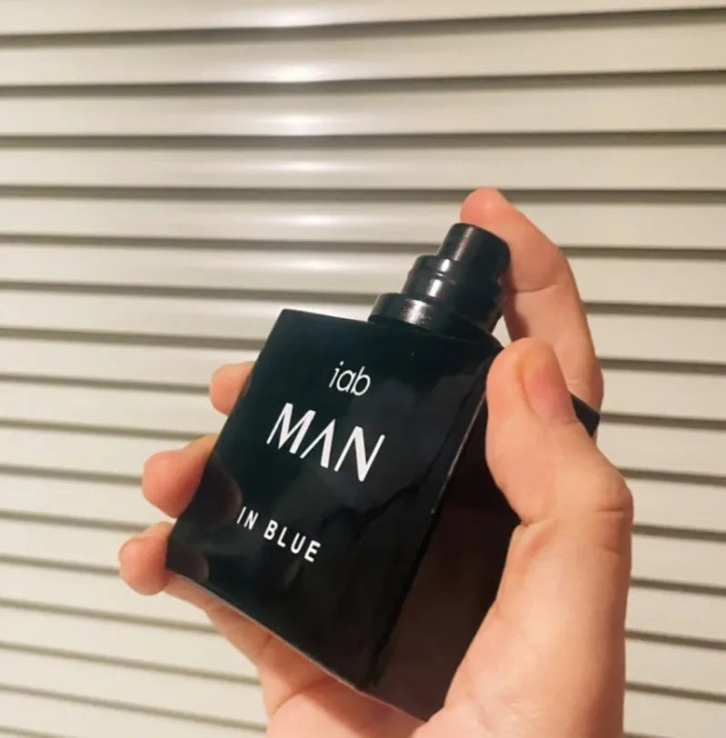 50ml glass bottle of men's citrus perfume with spray top