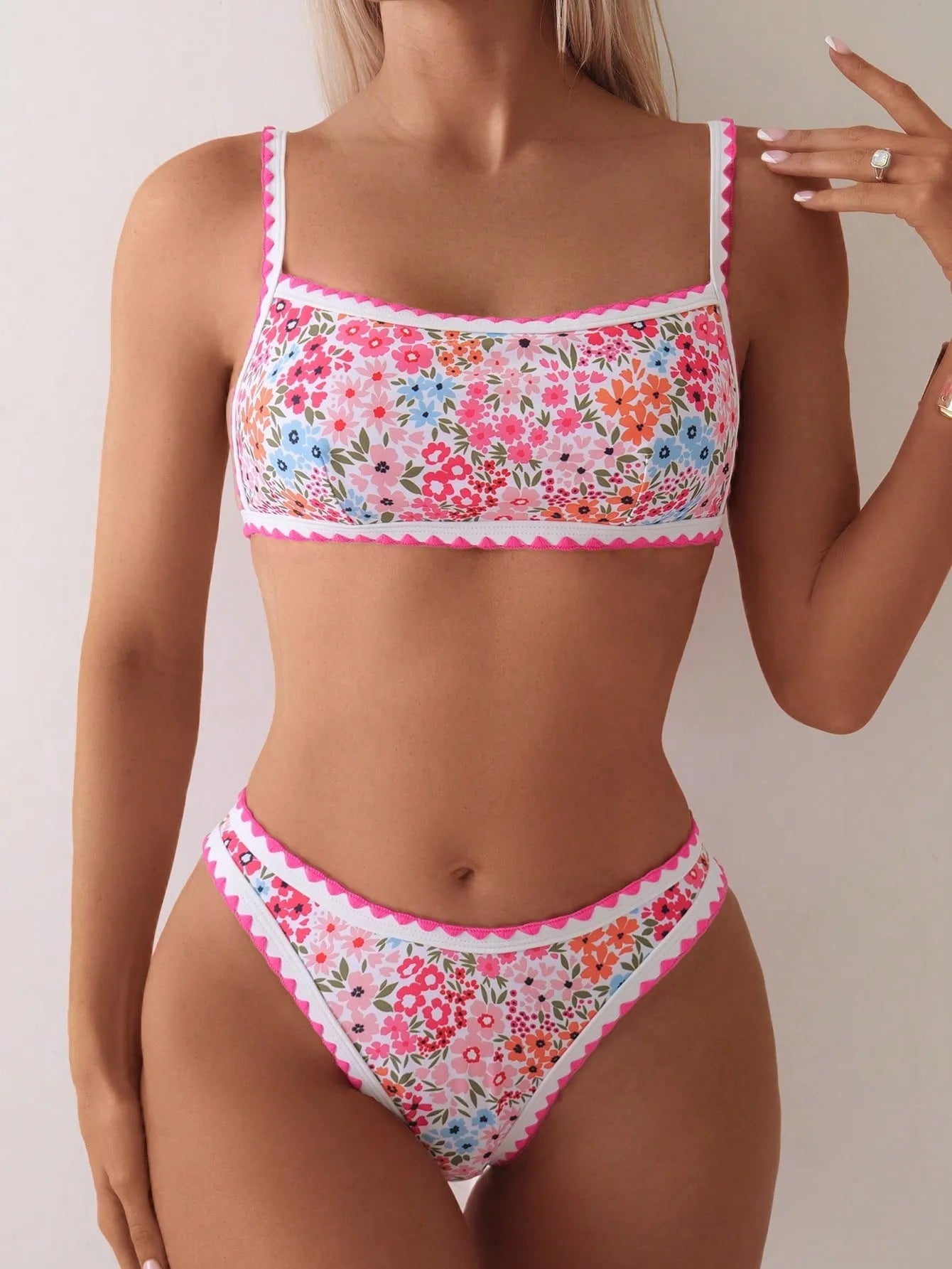 Women's printed swimming bikini with lace-up split bra and matching briefs in picture colour