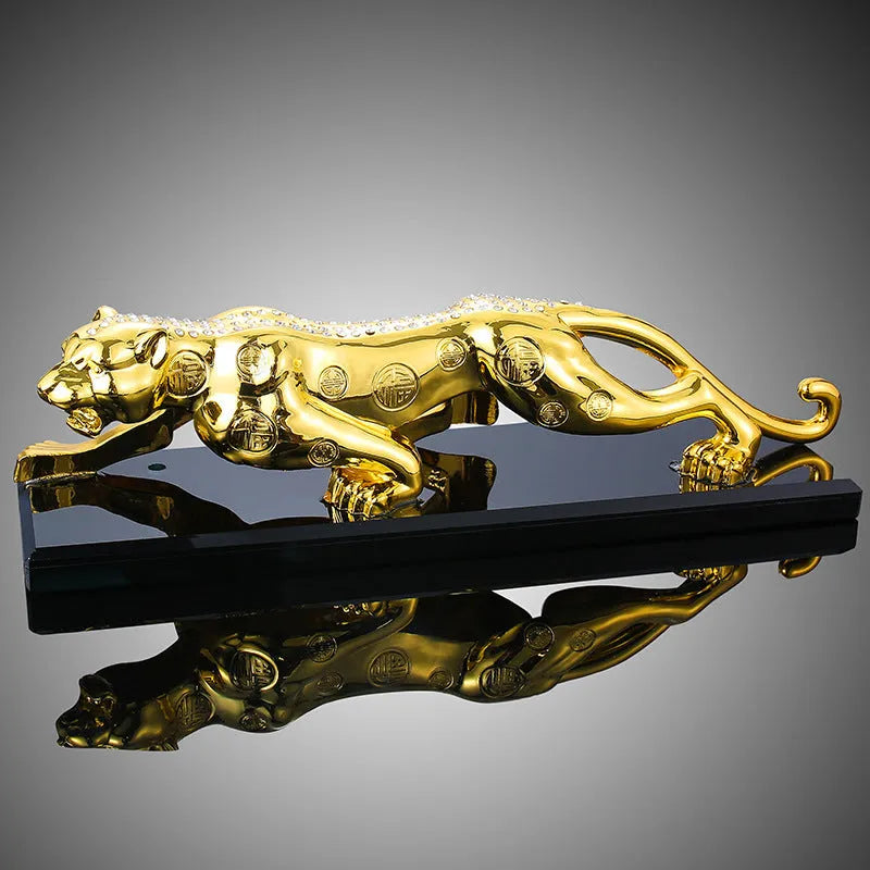 Leopard car perfume ornament made of alloy crystal base plate and resin in gold finish on car dashboard