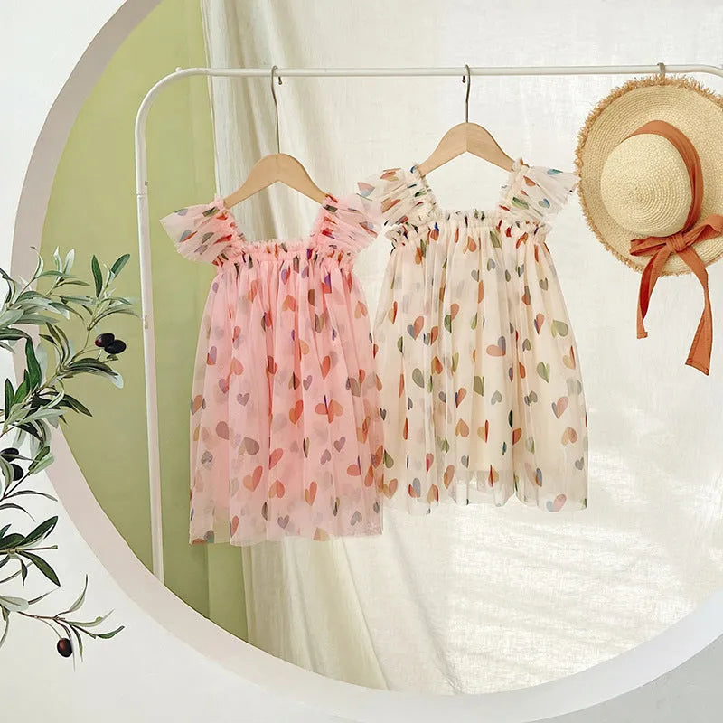 Girls summer dress with heart print mesh outer and cotton lining, pink or apricot, sizes 80cm to 130cm