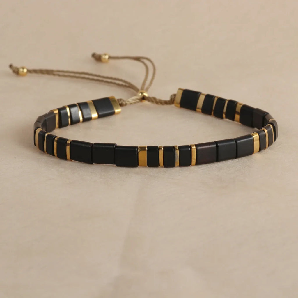 Geometric glass beaded bracelet with pull beads in five colour options