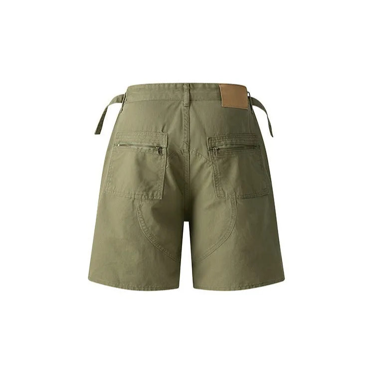Retro-style loose-fit washed cotton shorts for men and women with a half elastic waistband.